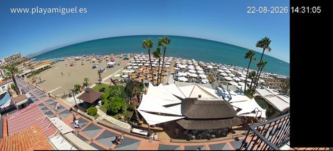 Online camera covering the grounds of a seaside hotel