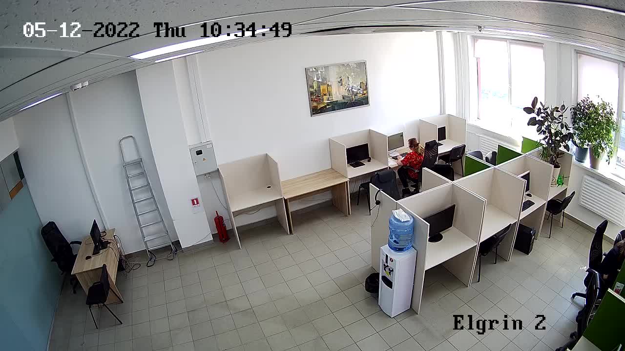 Online view of a coworking open space with workstations