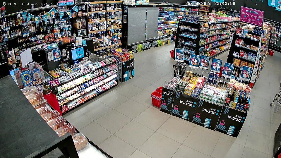 Online view of a sales floor with the checkout area and shelving